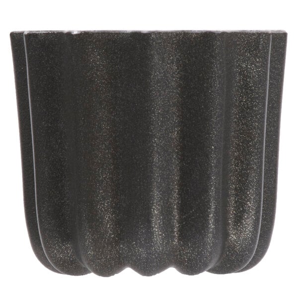 A black aluminum Matfer Bourgeat cannele mold with a shiny surface.