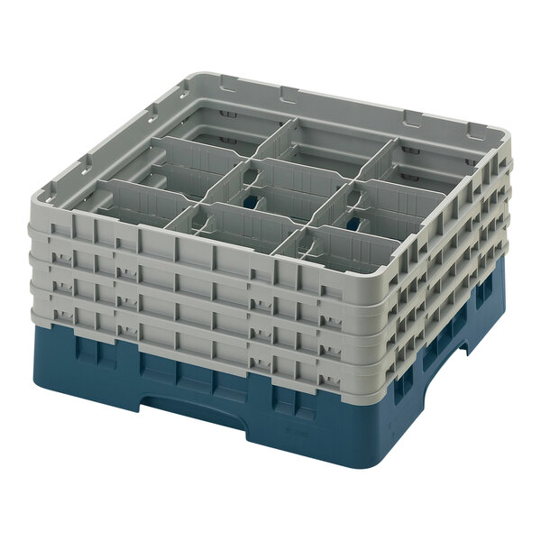 A teal plastic Cambro glass rack with nine compartments.