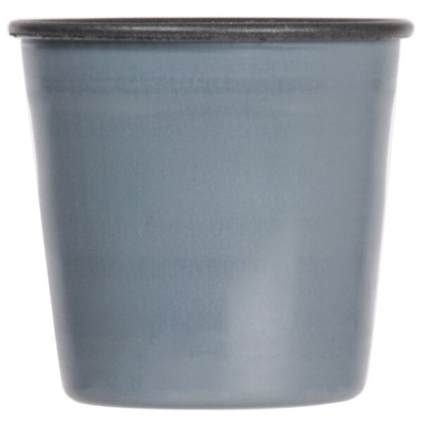 A black non-stick Matfer Bourgeat rum baba mold with a black rim.