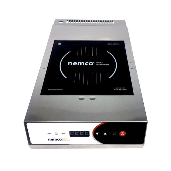 A silver Nemco countertop induction range with a black screen.