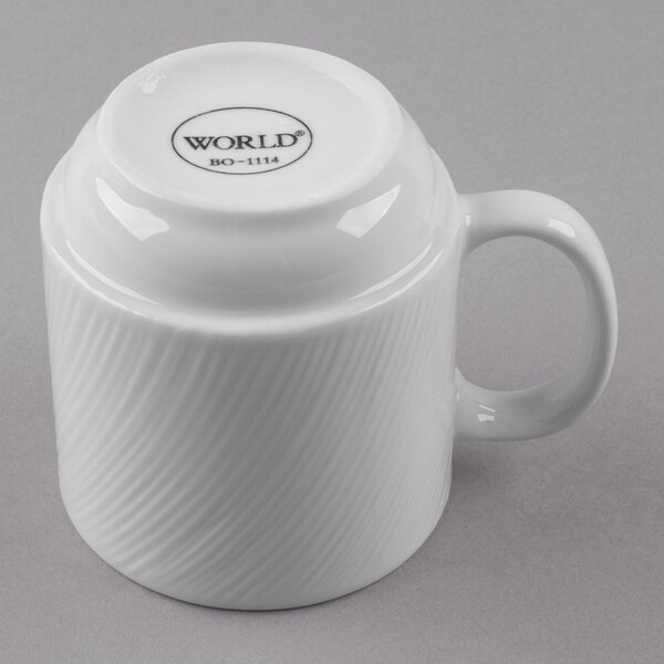 A Libbey bright white stacking mug with a handle.