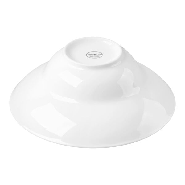 A white ceramic bowl shown upside down.