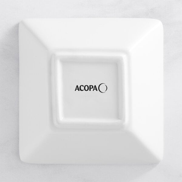 A bright white square Acopa porcelain bowl.