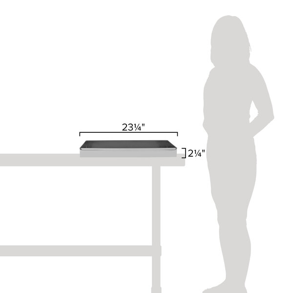 A Matfer Bourgeat stainless steel rectangular cake pan on a table.