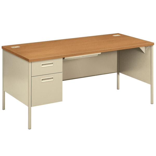 A Hon Metro Classic pedestal desk with two drawers.