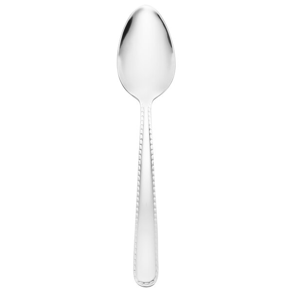 A Reed & Barton silver dessert spoon with a pointy design on a white background.