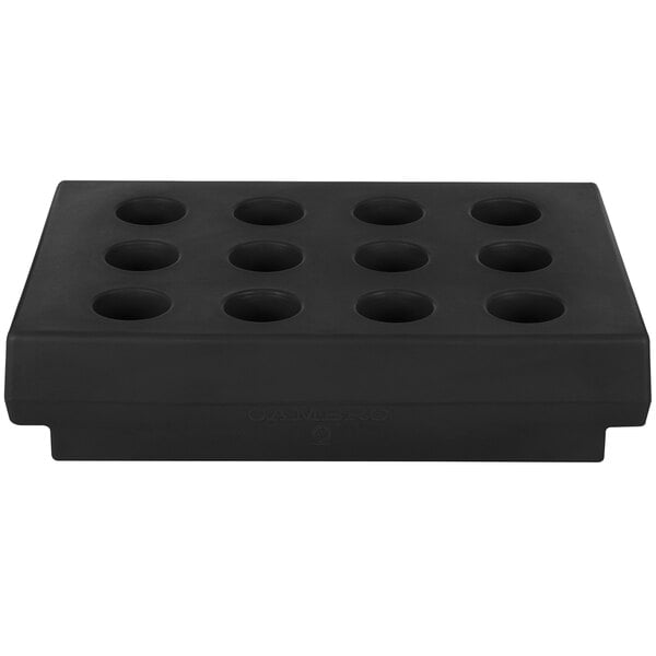 A black rectangular cutlery rack with eight holes.