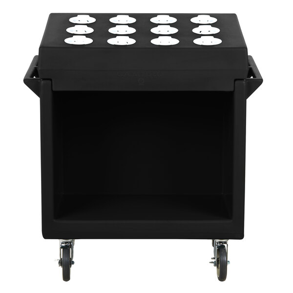 A black Cambro cutlery rack with six white circles.