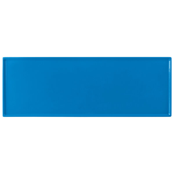 A sky blue rectangular cast aluminum cooling platter.