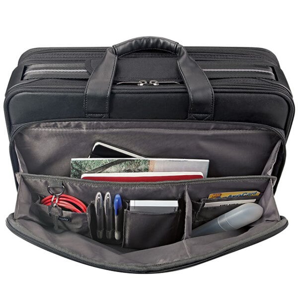 A black Solo Classic Smart Strap Briefcase with a laptop inside.