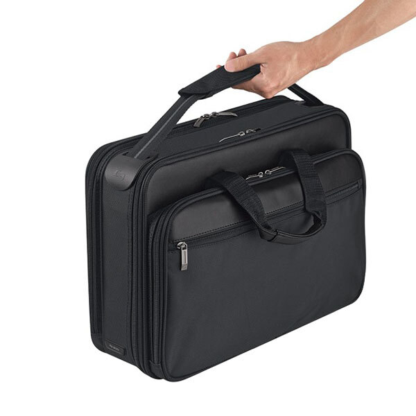 A hand holding a black Solo Classic Smart Strap briefcase.