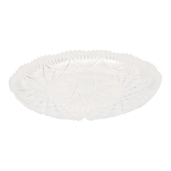 A clear plastic Fineline Catering tray with a scalloped design.