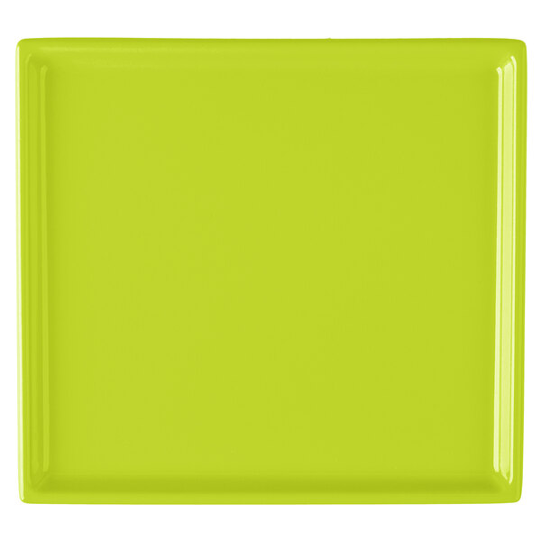 A lime green rectangular cast aluminum cooling platter with a black border.