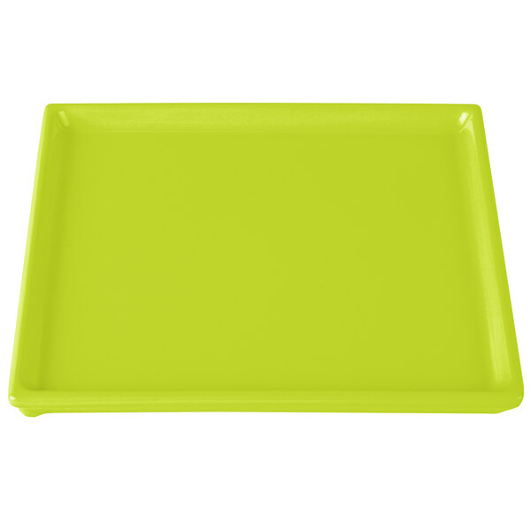 A lime green rectangular cast aluminum cooling platter.