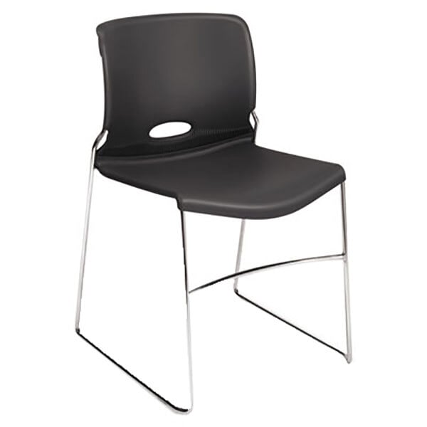 A black HON Olson stacking chair with chrome legs.