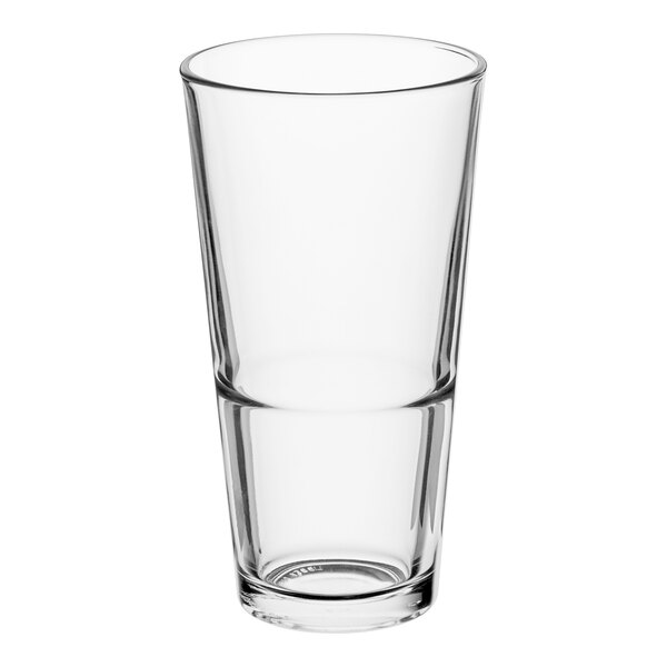 A clear Libbey mixing glass with a white background.