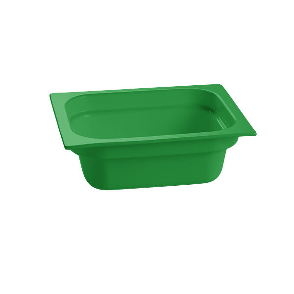 A green cast aluminum food pan with a white background.