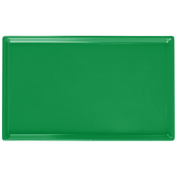 A green rectangular cast aluminum cooling platter.