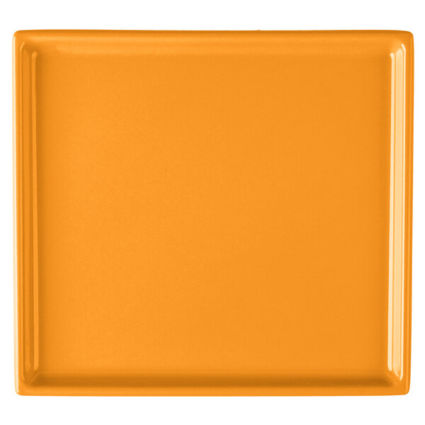 An orange rectangular cast aluminum cooling platter with a white background.