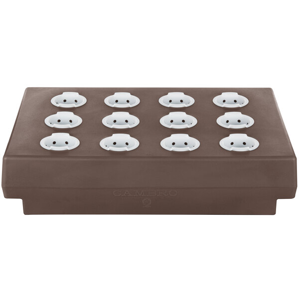 A dark brown rectangular Cambro cutlery rack with white plastic covers.