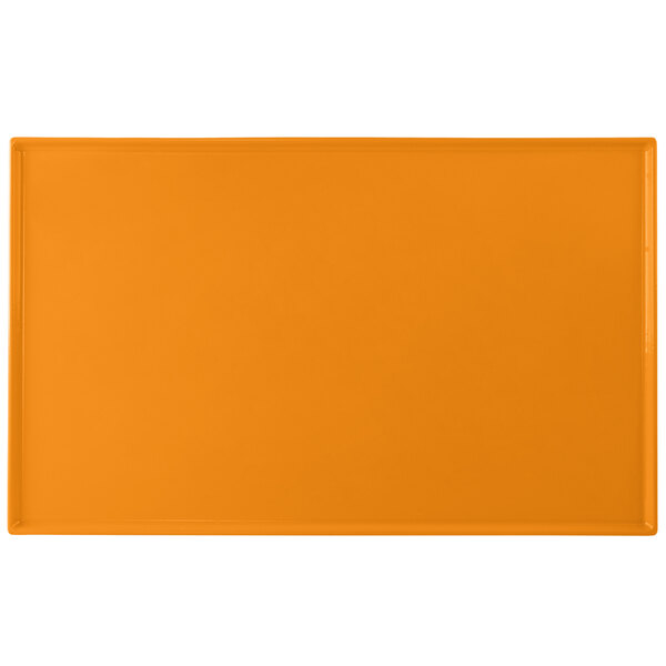 An orange rectangular cast aluminum cooling platter.