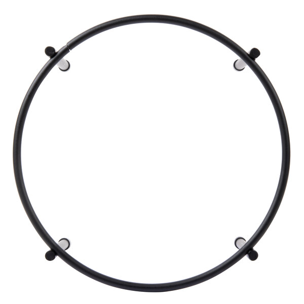 A circular black Clipper Mill pizza stand with metal rods.