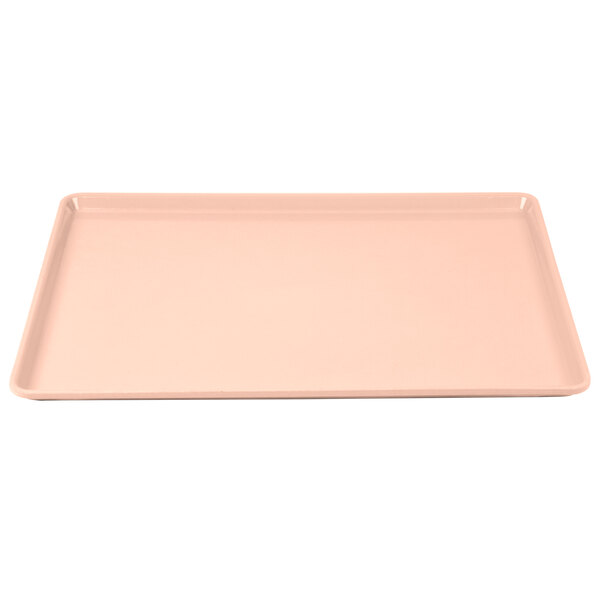 A pink rectangular Cambro dietary tray.