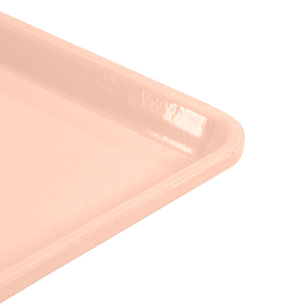 A light peach plastic Cambro dietary tray.