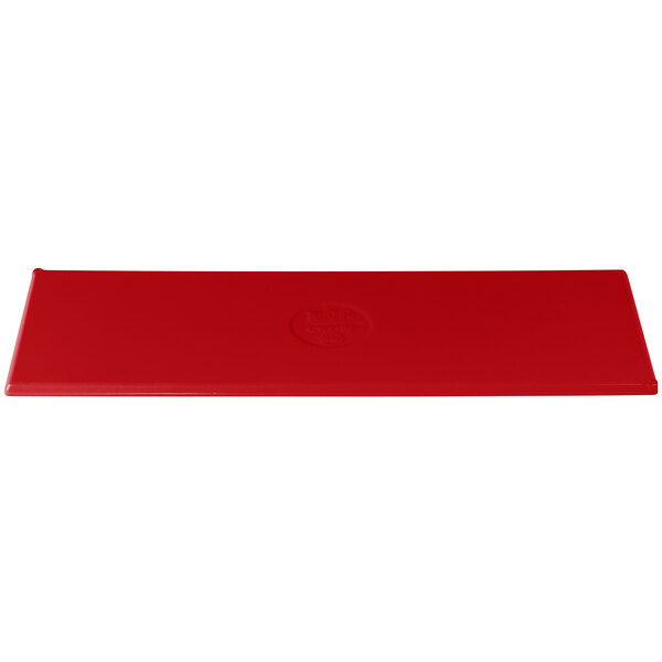 A red rectangular cast aluminum cooling platter with a logo on it.