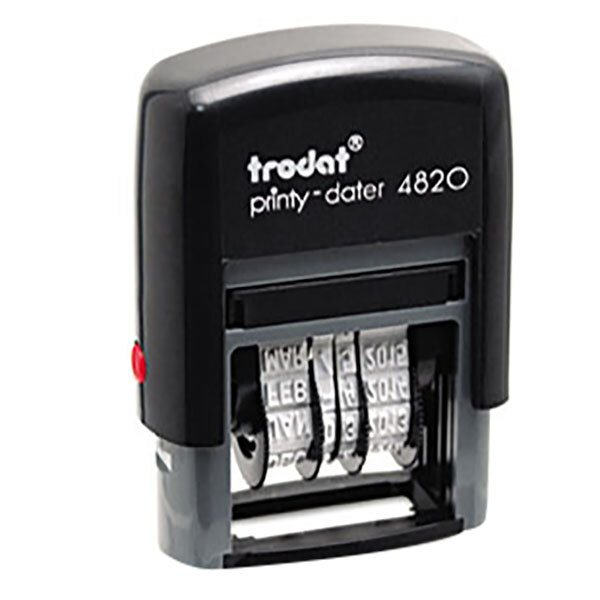 A black Trodat self-inking date stamp with white text.