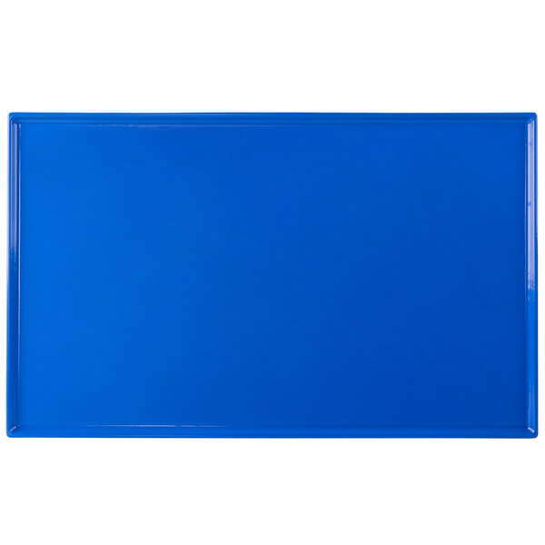 A cobalt blue rectangular Tablecraft metal platter.
