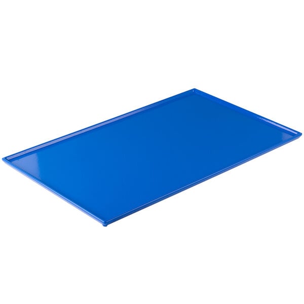 A cobalt blue Tablecraft rectangular cast aluminum cooling platter.