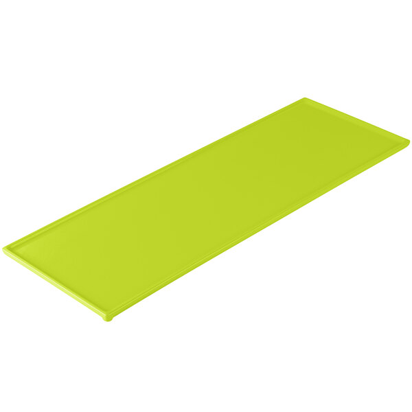 A lime green rectangular cast aluminum Tablecraft cooling platter.