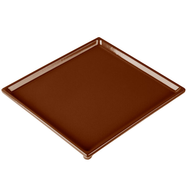 A brown rectangular cast aluminum cooling platter.