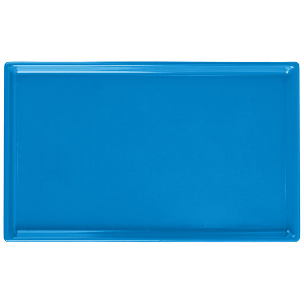 A sky blue rectangular cast aluminum platter with a white border.