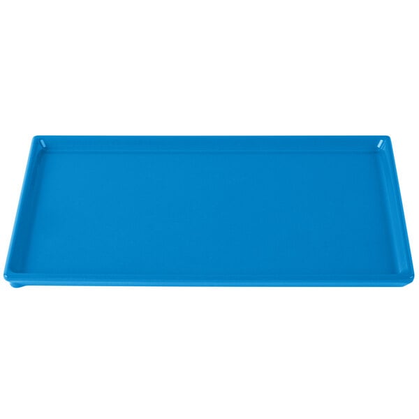 A sky blue rectangular cast aluminum cooling platter on a white background.