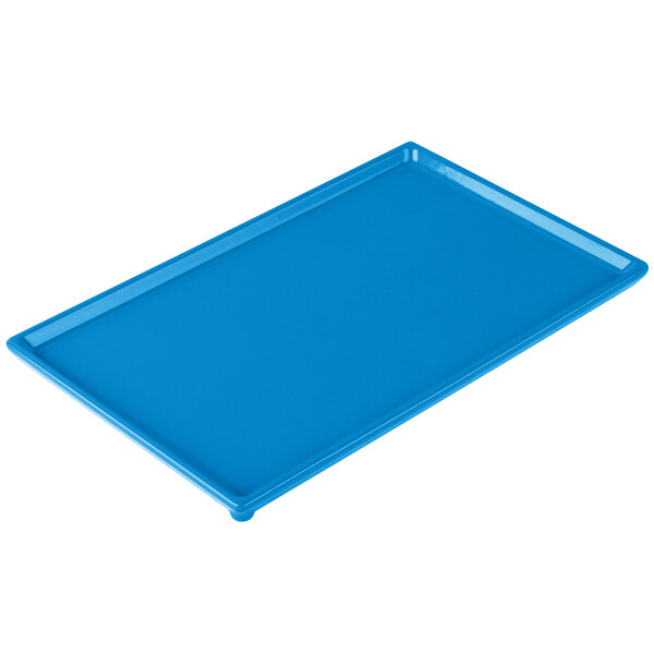 A sky blue rectangular cast aluminum cooling platter on a white background.