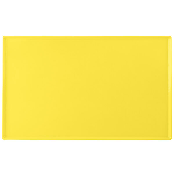 A yellow rectangular cast aluminum cooling platter.