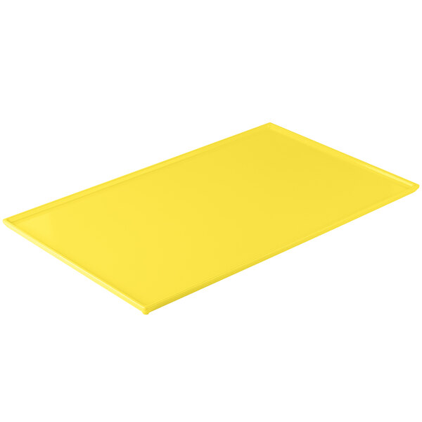 A yellow rectangular cast aluminum cooling platter.