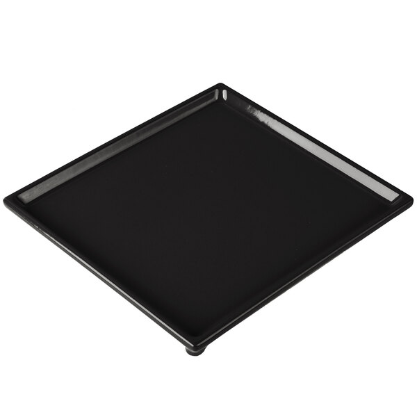 A black rectangular cast aluminum cooling platter with a black border.