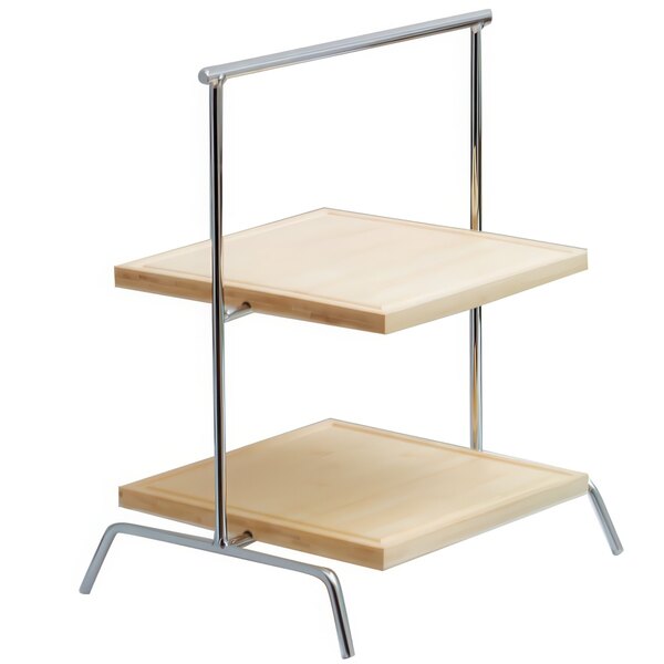 A wood shelf on a metal stand with metal legs.