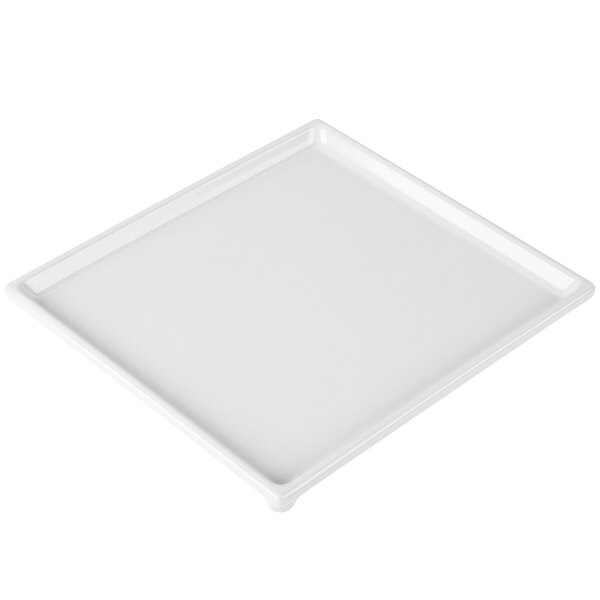 A white rectangular cast aluminum cooling platter with a white background.