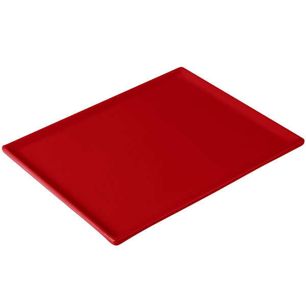 A red rectangular cast aluminum cooling platter on a white background.