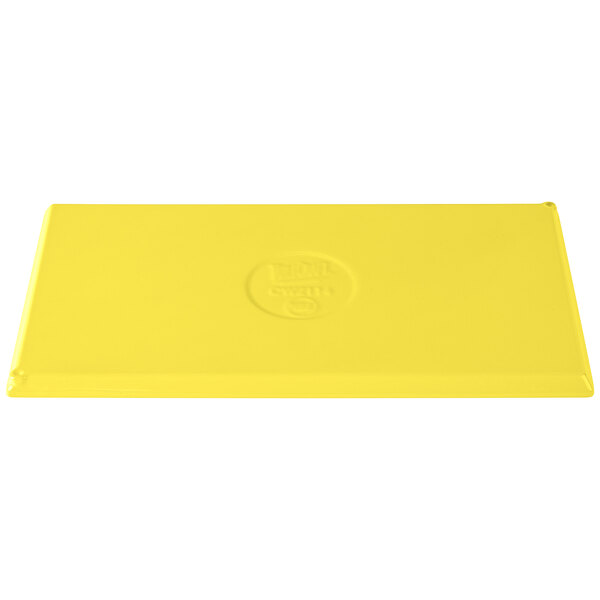 A yellow rectangular Tablecraft cooling platter with a logo on it.