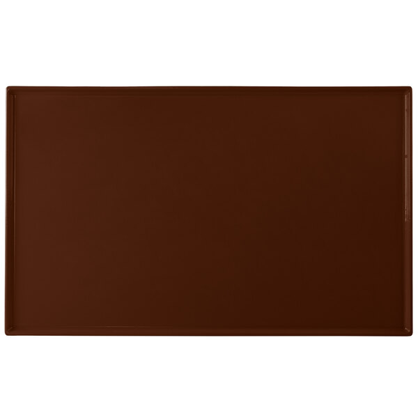 A brown rectangular cast aluminum cooling platter with a white border.