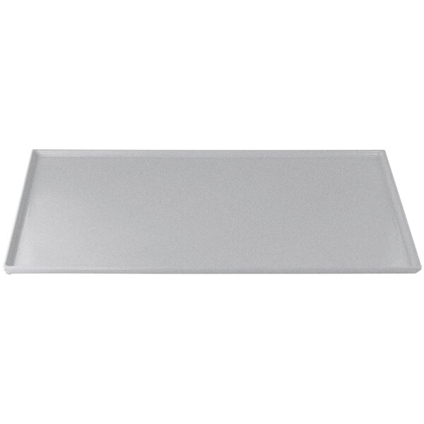 A natural cast aluminum rectangular tray with a white surface and black border.
