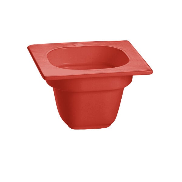 A red Tablecraft cast aluminum food pan with a square top.