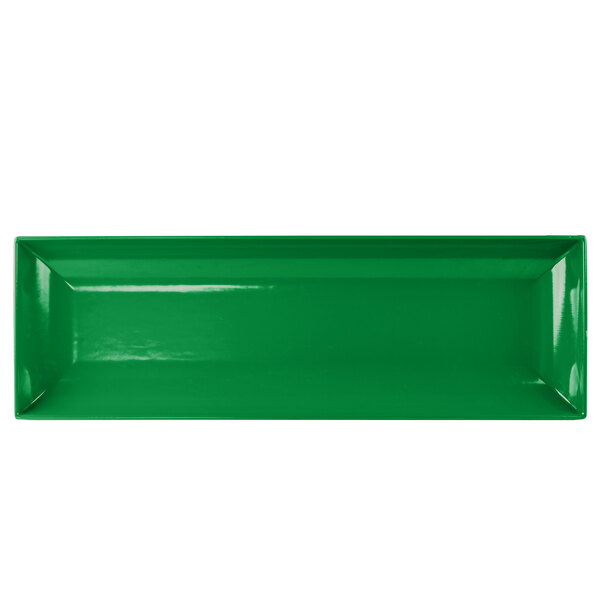 A green rectangular cast aluminum platter with white edges.