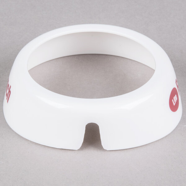 A white circular Tablecraft plastic dispenser collar with maroon text.