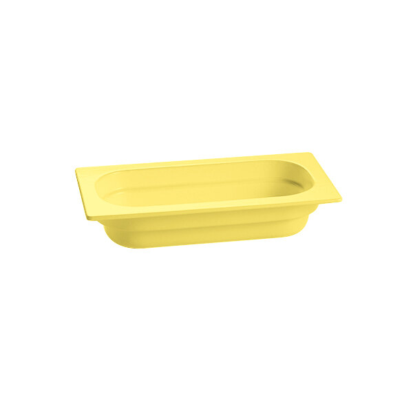 A yellow rectangular Tablecraft cast aluminum food pan.